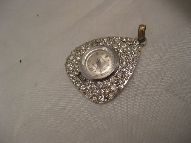 SHERATON JEWELED SWISS GEM STUDDED PENDANT WATCH  