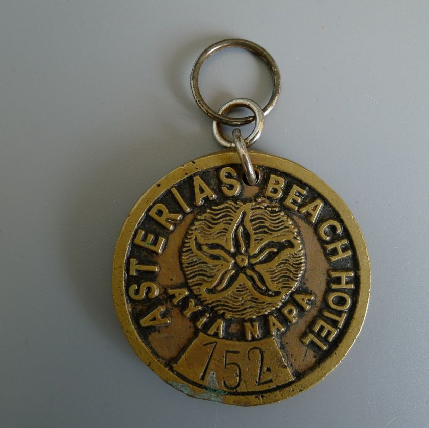 vintage brass / bronze Asterias Beach hotel Ayia Napa room key fob tag 