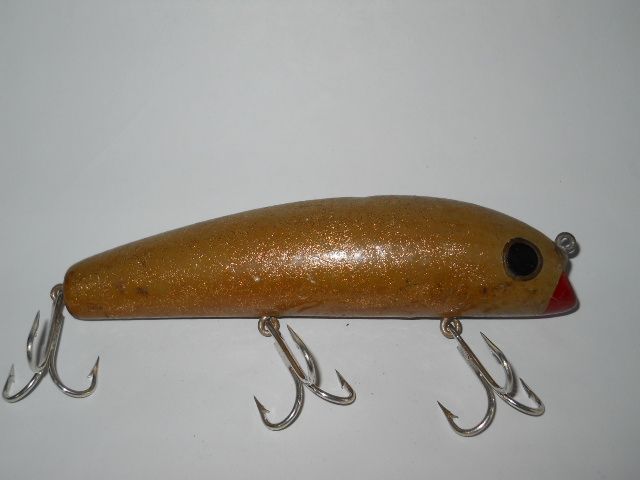 To see photos of Rare and Collectible Antique Fishing Lures and Reels 