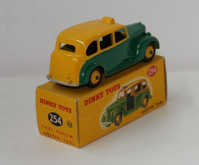 DINKY TOYS 254 AUSTIN TAXI YELLOW & GREEN BLACK INTERIOR NMIB  